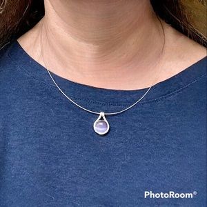 Silver necklace with blue bead